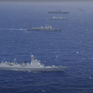 What Chinese hidden purposes of its military drills in the South China Sea?